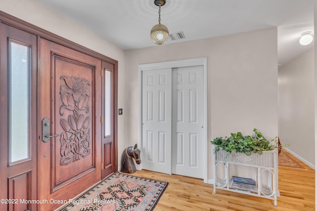 716 Hyson Rd, Jackson, NJ 08527 - entrance foyer featuring wood finished floors and healthy amount of natural light