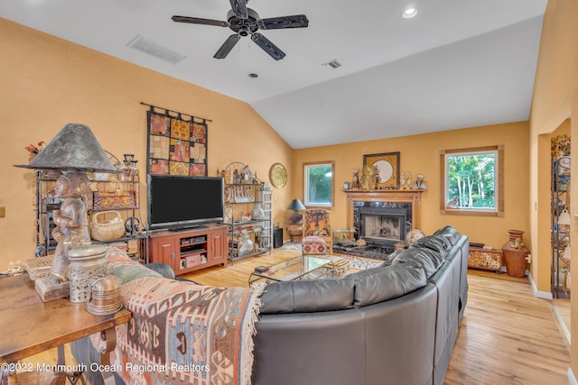 716 Hyson Rd, Jackson, NJ 08527 - living room featuring vaulted ceiling, light wood-style floors, ceiling fan, a fireplace, and recessed lighting
