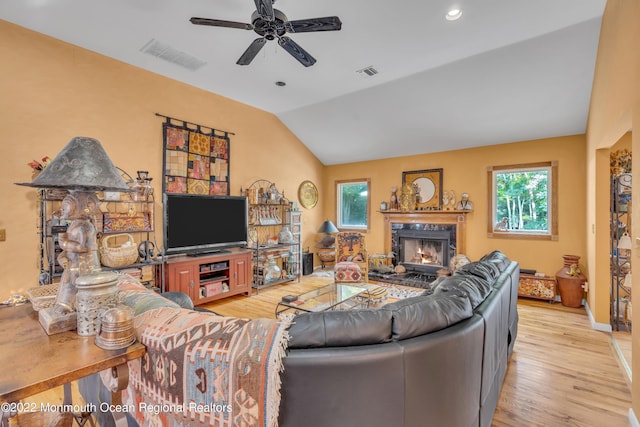 716 Hyson Rd, Jackson, NJ 08527 - living area featuring a ceiling fan, vaulted ceiling, light wood-style floors, a fireplace, and recessed lighting