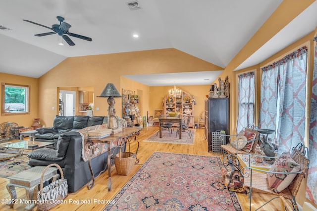 716 Hyson Rd, Jackson, NJ 08527 - living room featuring lofted ceiling, light wood-type flooring, a chandelier, and ceiling fan
