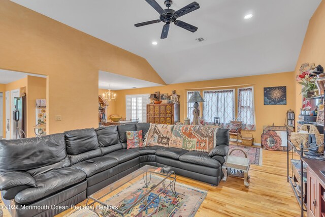 716 Hyson Rd, Jackson, NJ 08527 - living room with vaulted ceiling, wood finished floors, a chandelier, ceiling fan, and recessed lighting