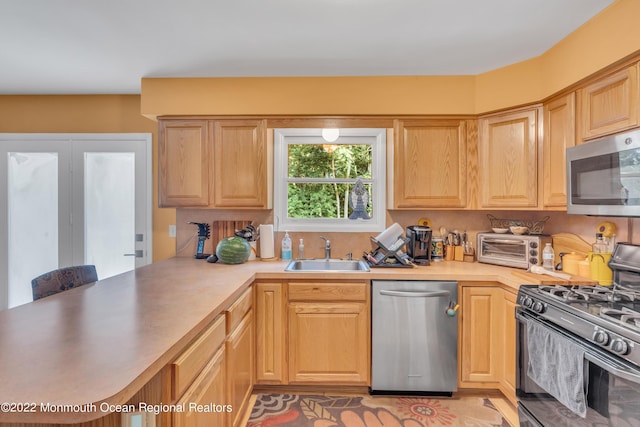 716 Hyson Rd, Jackson, NJ 08527 - kitchen featuring appliances with stainless steel finishes, light countertops, and light brown cabinets