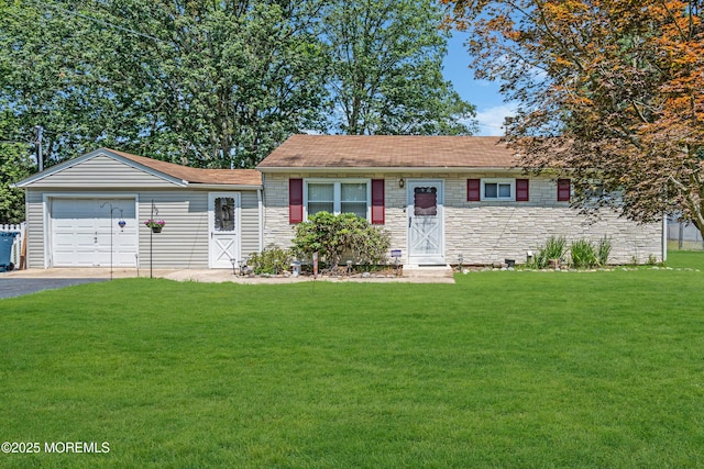 530 Aldrich Rd, Howell, NJ 07731 - ranch-style home with a front yard, stone siding, driveway, an attached garage, and a shingled roof