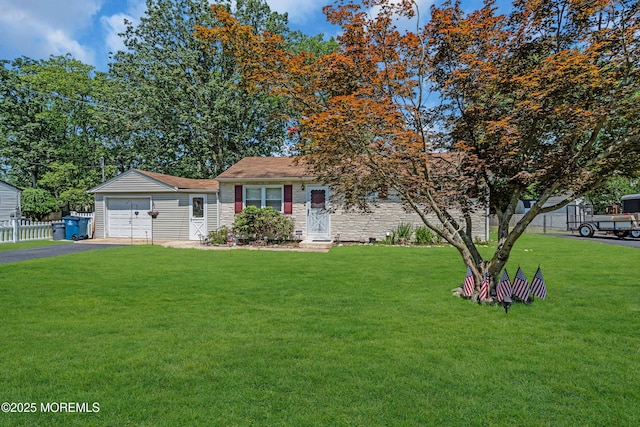 530 Aldrich Rd, Howell, NJ 07731 - view of front facade featuring driveway, a garage, and stone siding