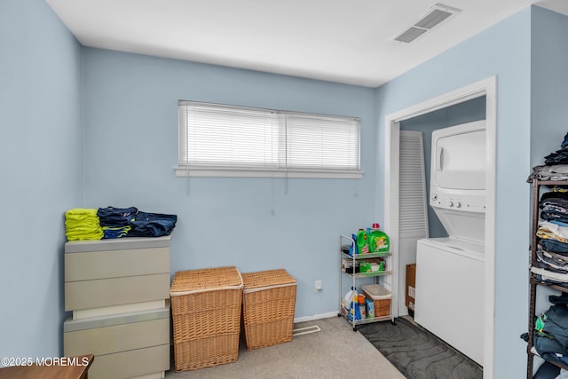 530 Aldrich Rd, Howell, NJ 07731 - washroom with stacked washing machine and dryer and carpet