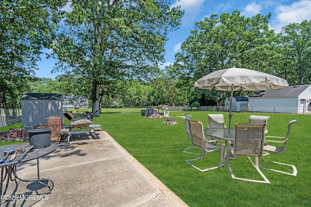 530 Aldrich Rd, Howell, NJ 07731 - fenced backyard with a shed, outdoor dining space, and a patio