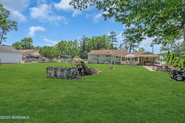 530 Aldrich Rd, Howell, NJ 07731 - view of yard featuring an outdoor fire pit and a patio area