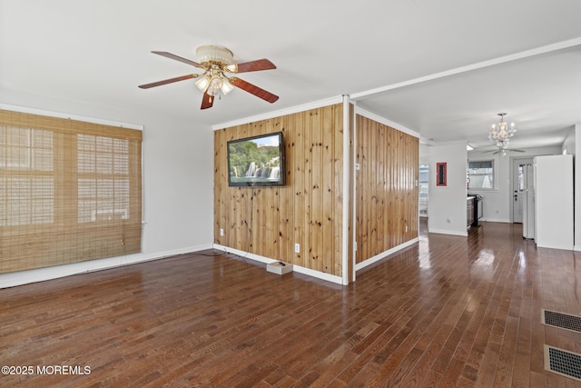 118 Sampson Ave, Seaside Heights, NJ 08751 - unfurnished room with a chandelier, a ceiling fan, wood finished floors, wood walls, and ornamental molding