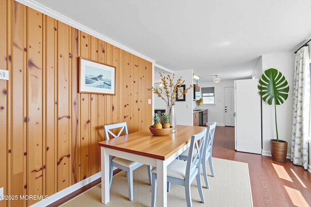 118 Sampson Ave, Seaside Heights, NJ 08751 - dining space with dark wood-style floors and wooden walls