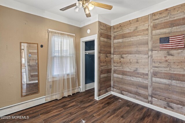 242 Sherman Ave, Seaside Heights, NJ 08751 - unfurnished room featuring a ceiling fan and dark wood-style floors