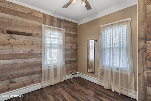 242 Sherman Ave, Seaside Heights, NJ 08751 - empty room with wooden walls, ceiling fan, and dark wood-type flooring