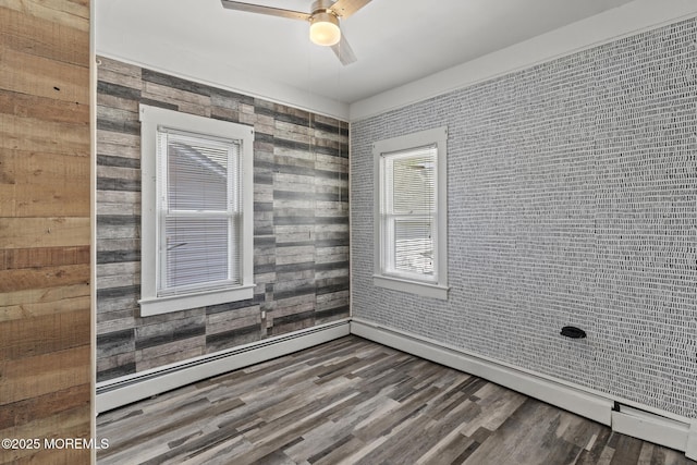 242 Sherman Ave, Seaside Heights, NJ 08751 - spare room with ceiling fan and wood finished floors