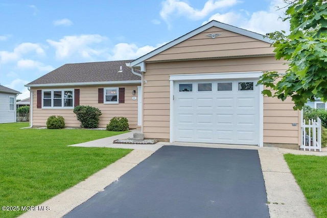 3 Andover Ct, Toms River, NJ 08757 - single story home with asphalt driveway, a garage, and a front lawn