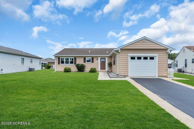 3 Andover Ct, Toms River, NJ 08757 - ranch-style home with driveway, an attached garage, and a front lawn