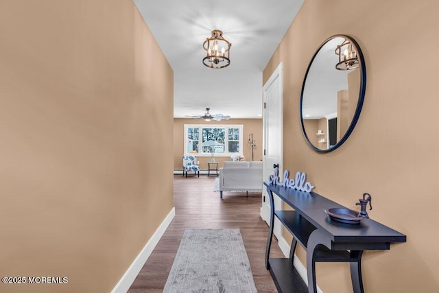 3 Andover Ct, Toms River, NJ 08757 - hallway with a chandelier and dark wood-type flooring