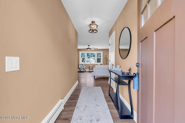 3 Andover Ct, Toms River, NJ 08757 - hallway with dark wood-style flooring and a chandelier