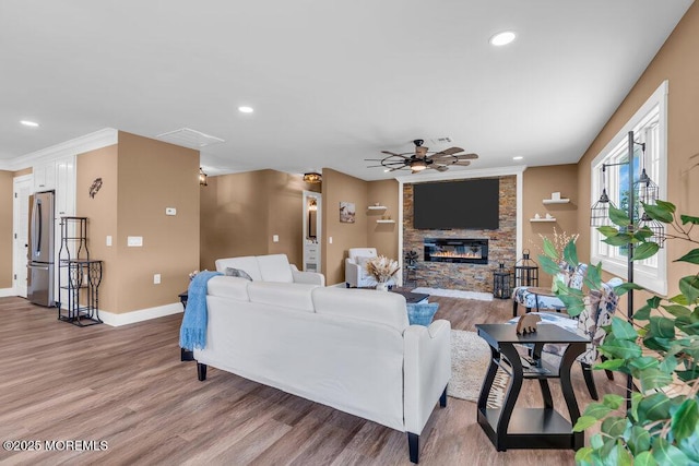 3 Andover Ct, Toms River, NJ 08757 - living room featuring ceiling fan, light wood finished floors, recessed lighting, and a stone fireplace