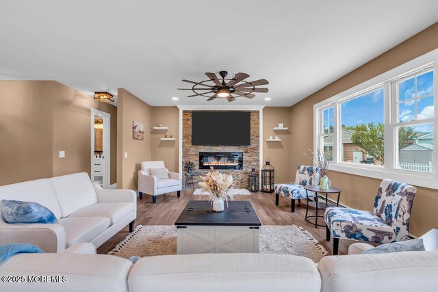3 Andover Ct, Toms River, NJ 08757 - living room with ceiling fan, wood finished floors, a stone fireplace, and recessed lighting
