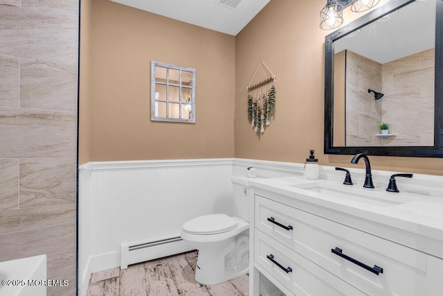 3 Andover Ct, Toms River, NJ 08757 - bathroom featuring a baseboard heating unit, a wainscoted wall, vanity, and a shower