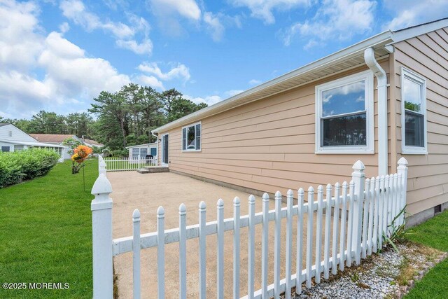 3 Andover Ct, Toms River, NJ 08757 - view of side of home with a patio