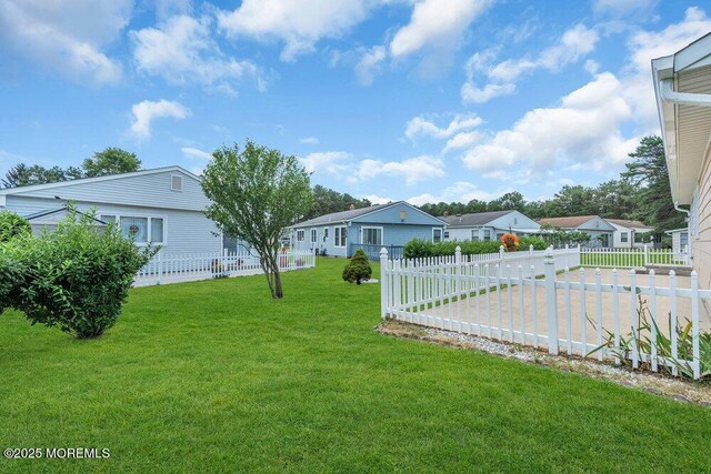 3 Andover Ct, Toms River, NJ 08757 - fenced yard with a patio area and a residential view