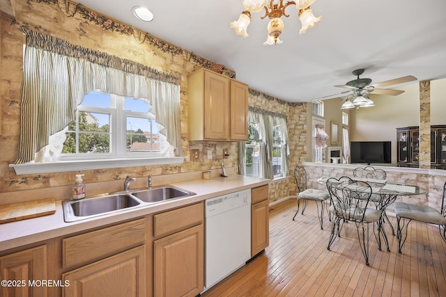 28 Brent Dr, Howell, NJ 07731 - kitchen with white dishwasher, plenty of natural light, light countertops, and light wood finished floors