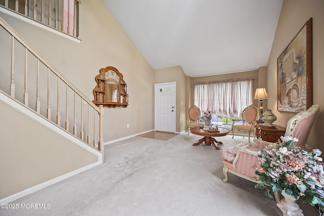 28 Brent Dr, Howell, NJ 07731 - living area with stairway, carpet, and high vaulted ceiling