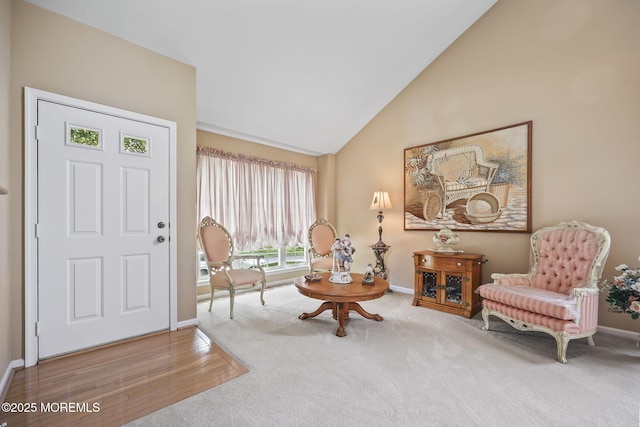 28 Brent Dr, Howell, NJ 07731 - foyer entrance with carpet floors, wood finished floors, and high vaulted ceiling