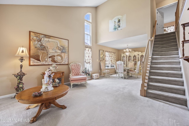 28 Brent Dr, Howell, NJ 07731 - carpeted foyer entrance featuring stairs, a chandelier, and a high ceiling