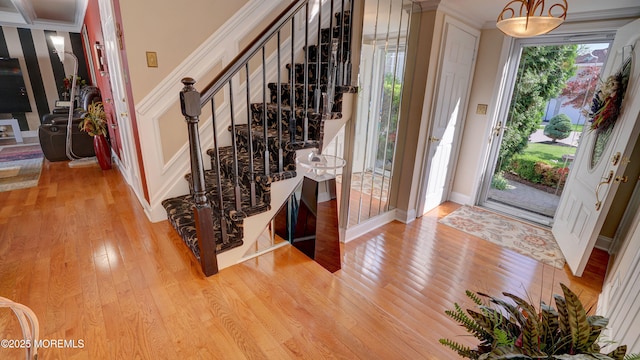 44 Kentucky Way, Freehold, NJ 07728 - entryway with hardwood / wood-style flooring, ornamental molding, and stairs