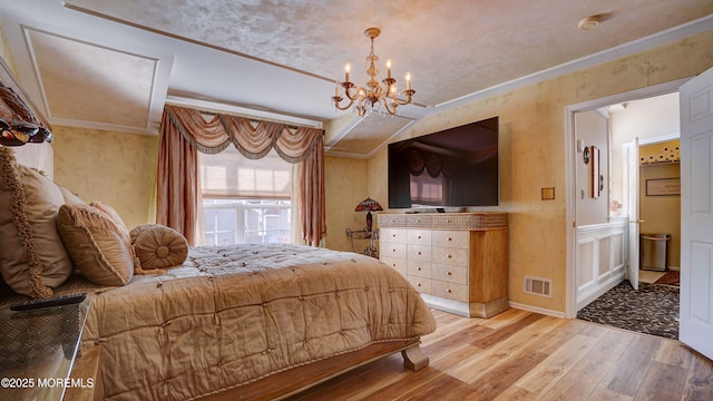 44 Kentucky Way, Freehold, NJ 07728 - bedroom featuring wood finished floors, a chandelier, crown molding, and ensuite bath