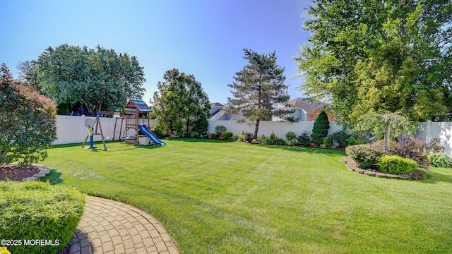 44 Kentucky Way, Freehold, NJ 07728 - fenced backyard featuring a playground