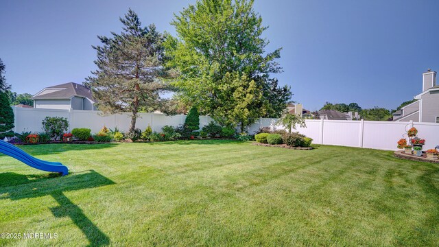44 Kentucky Way, Freehold, NJ 07728 - fenced backyard with a playground