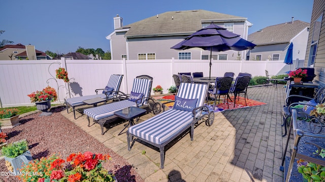44 Kentucky Way, Freehold, NJ 07728 - fenced backyard with outdoor dining space and a patio area