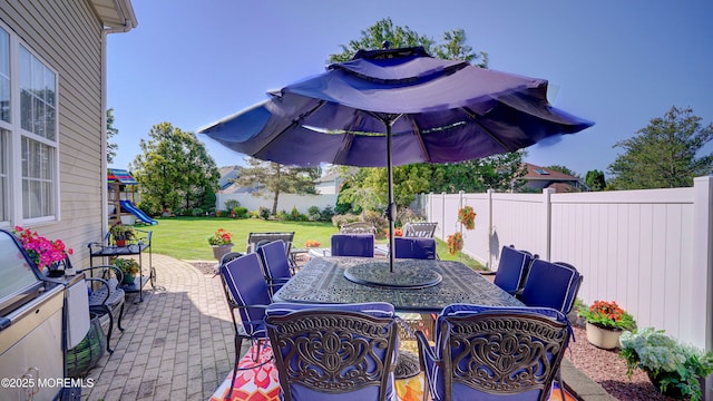 44 Kentucky Way, Freehold, NJ 07728 - fenced backyard with outdoor dining area, a playground, and a patio