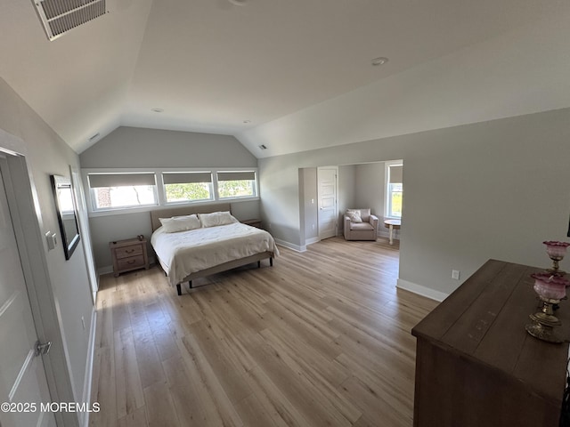1464 Earie Way, Forked River, NJ 08731 - bedroom featuring vaulted ceiling, multiple windows, and light wood-type flooring