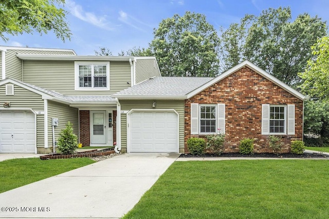 63 Oak Ln, Eatontown, NJ 07724 - view of front facade with an attached garage, concrete driveway, brick siding, and a front yard