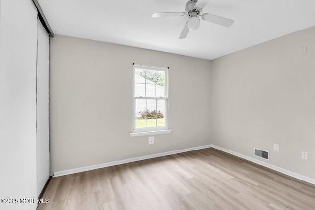 63 Oak Ln, Eatontown, NJ 07724 - spare room with wood finished floors and a ceiling fan