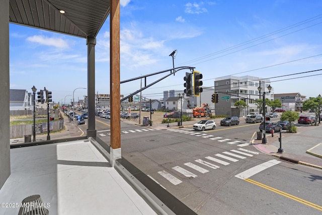 401 Boulevard 202, Seaside Heights, NJ 08751 - view of asphalt street featuring traffic lights, sidewalks, curbs, and street lights