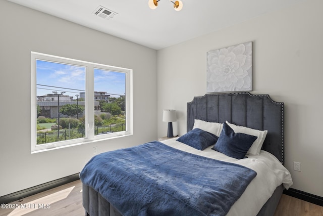 401 Boulevard 202, Seaside Heights, NJ 08751 - bedroom featuring wood finished floors and baseboards
