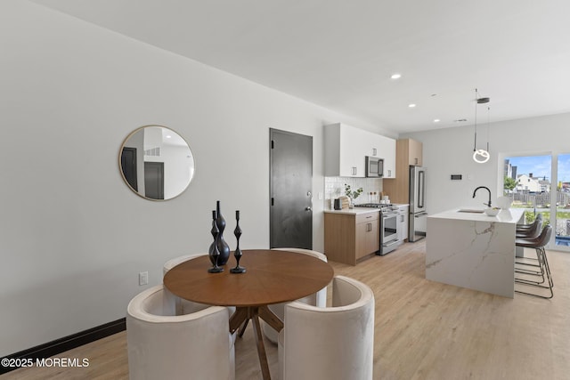 401 Boulevard 202, Seaside Heights, NJ 08751 - dining space with light wood-style floors and recessed lighting