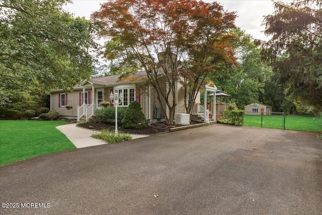 444 Cook Rd, Jackson, NJ 08527 - view of front of property featuring covered porch and asphalt driveway