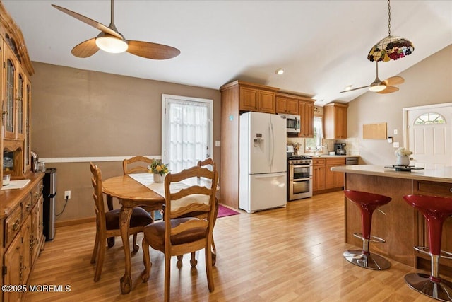 444 Cook Rd, Jackson, NJ 08527 - dining room with a ceiling fan, light wood-type flooring, and vaulted ceiling