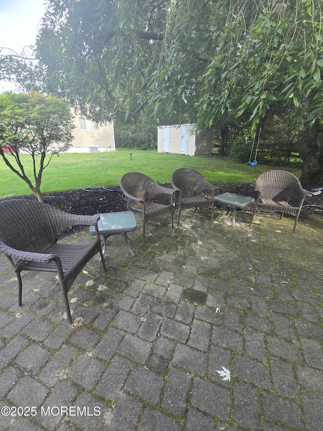 444 Cook Rd, Jackson, NJ 08527 - view of patio with a storage unit
