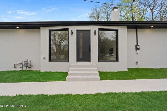 441 Slocum Pl, Oakhurst, NJ 07755 - doorway to property featuring stucco siding and a chimney