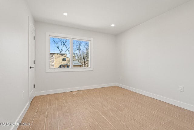 441 Slocum Pl, Oakhurst, NJ 07755 - empty room with light wood-style floors and recessed lighting