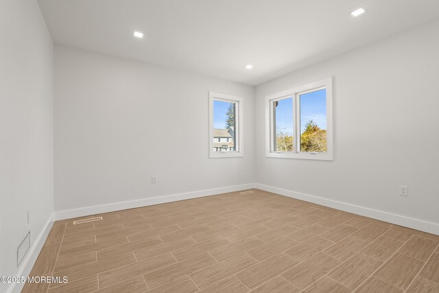 441 Slocum Pl, Oakhurst, NJ 07755 - unfurnished room with light wood finished floors and recessed lighting