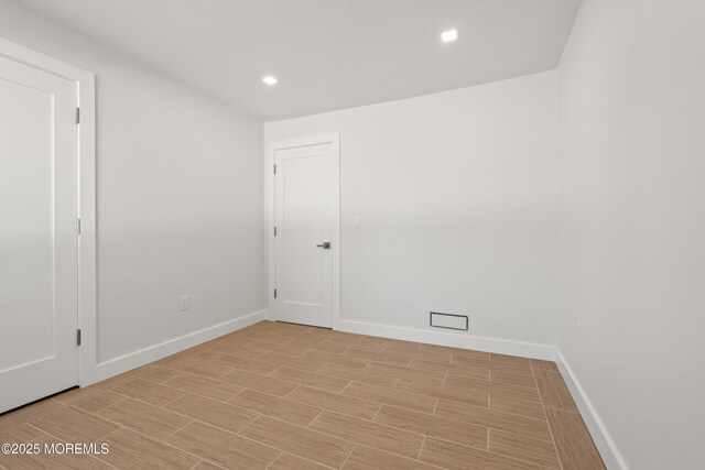 441 Slocum Pl, Oakhurst, NJ 07755 - empty room with light wood-style flooring and recessed lighting