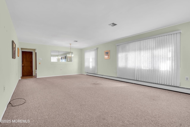 46 Carmacks Way, Toms River, NJ 08757 - carpeted empty room featuring baseboard heating and a chandelier
