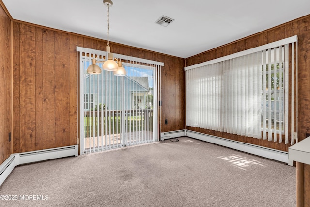 46 Carmacks Way, Toms River, NJ 08757 - unfurnished dining area with wood walls, carpet flooring, and a baseboard heating unit